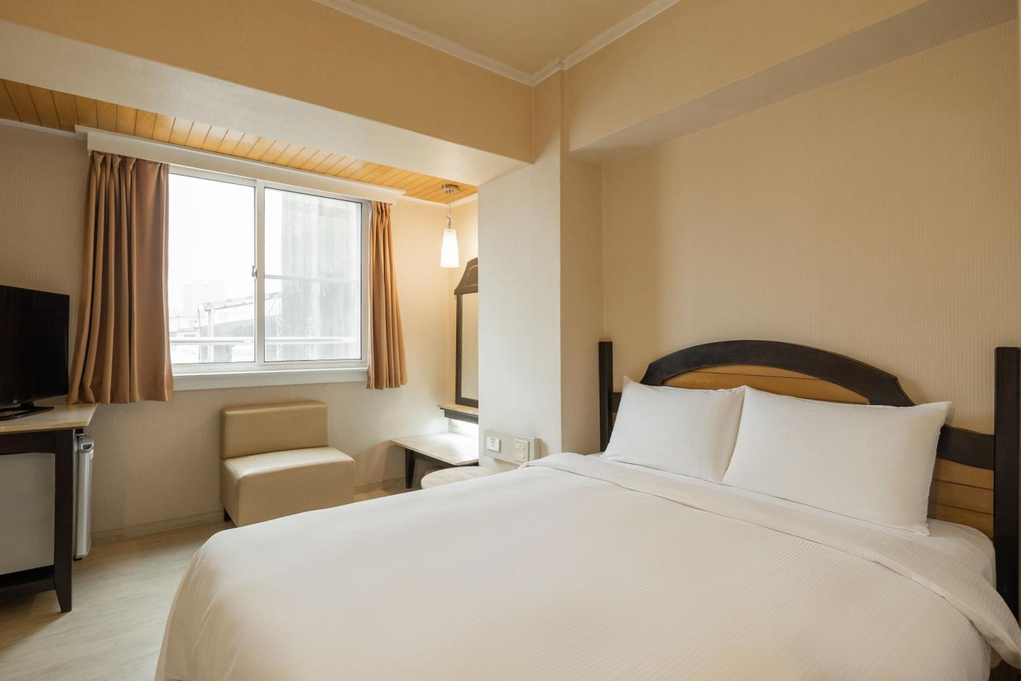 Kindness Hotel Weiwuying Kaohsiung Kamer foto